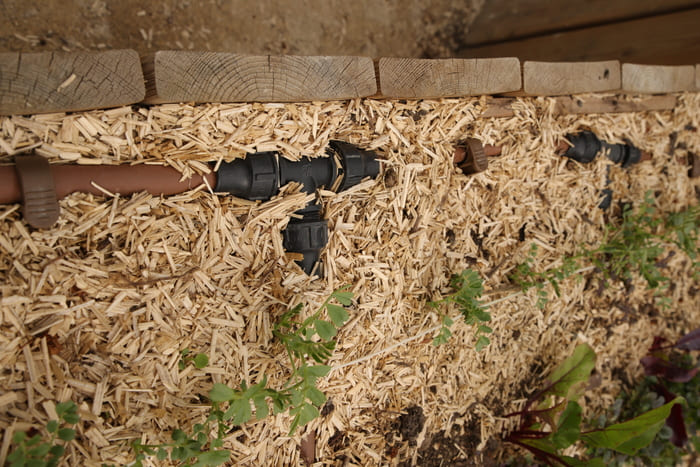 Té lock monté sur réseau d'irrigation